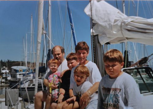 Dr. Paul Killen with his family sailing.